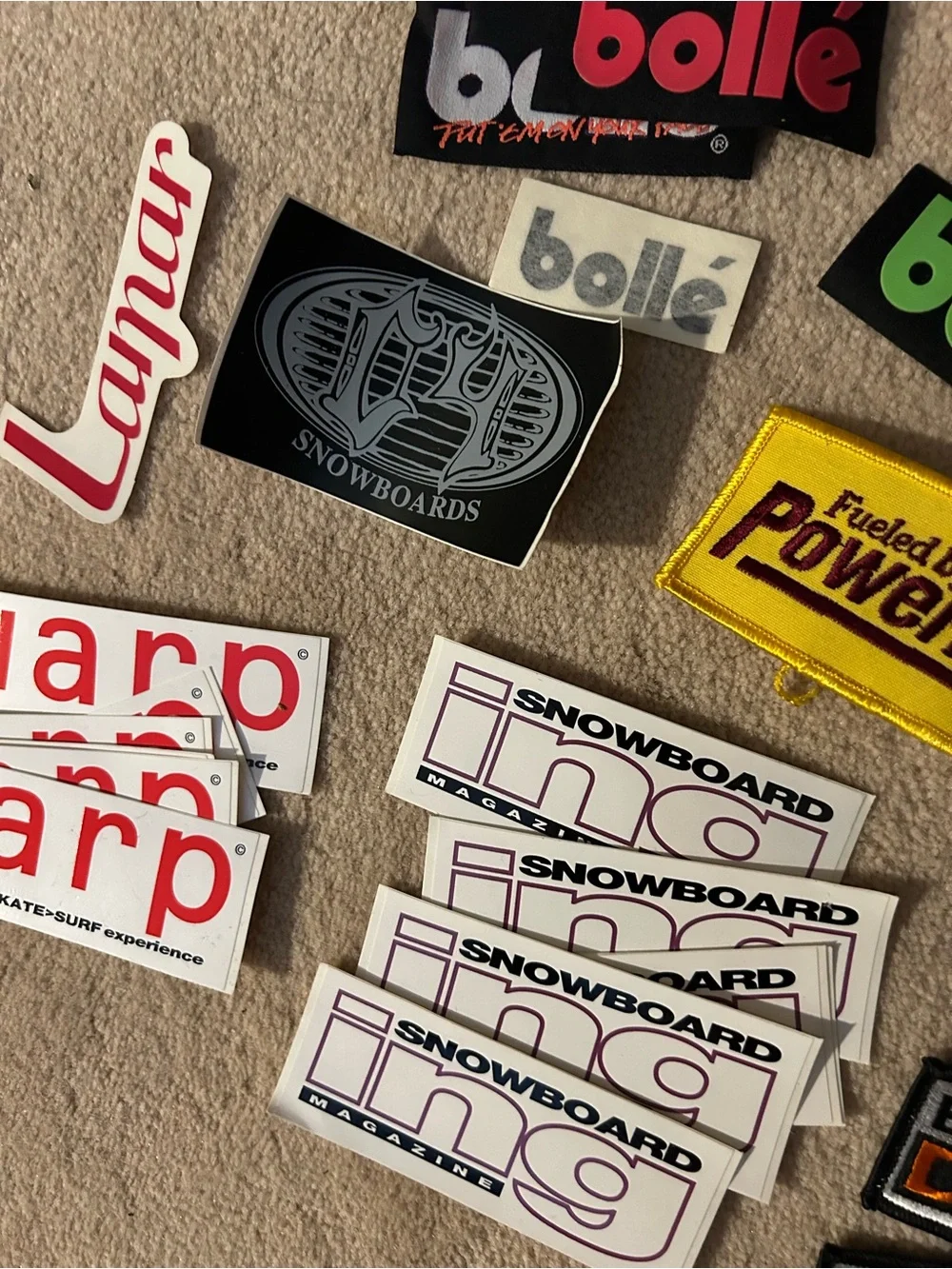 Snowboard patches and stickers. Multiple adv.